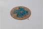 Preview: Solohalma board game on a round, beige leather playing field with light blue, turquoise playing pieces
